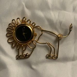 Lion watch brooch gold tone